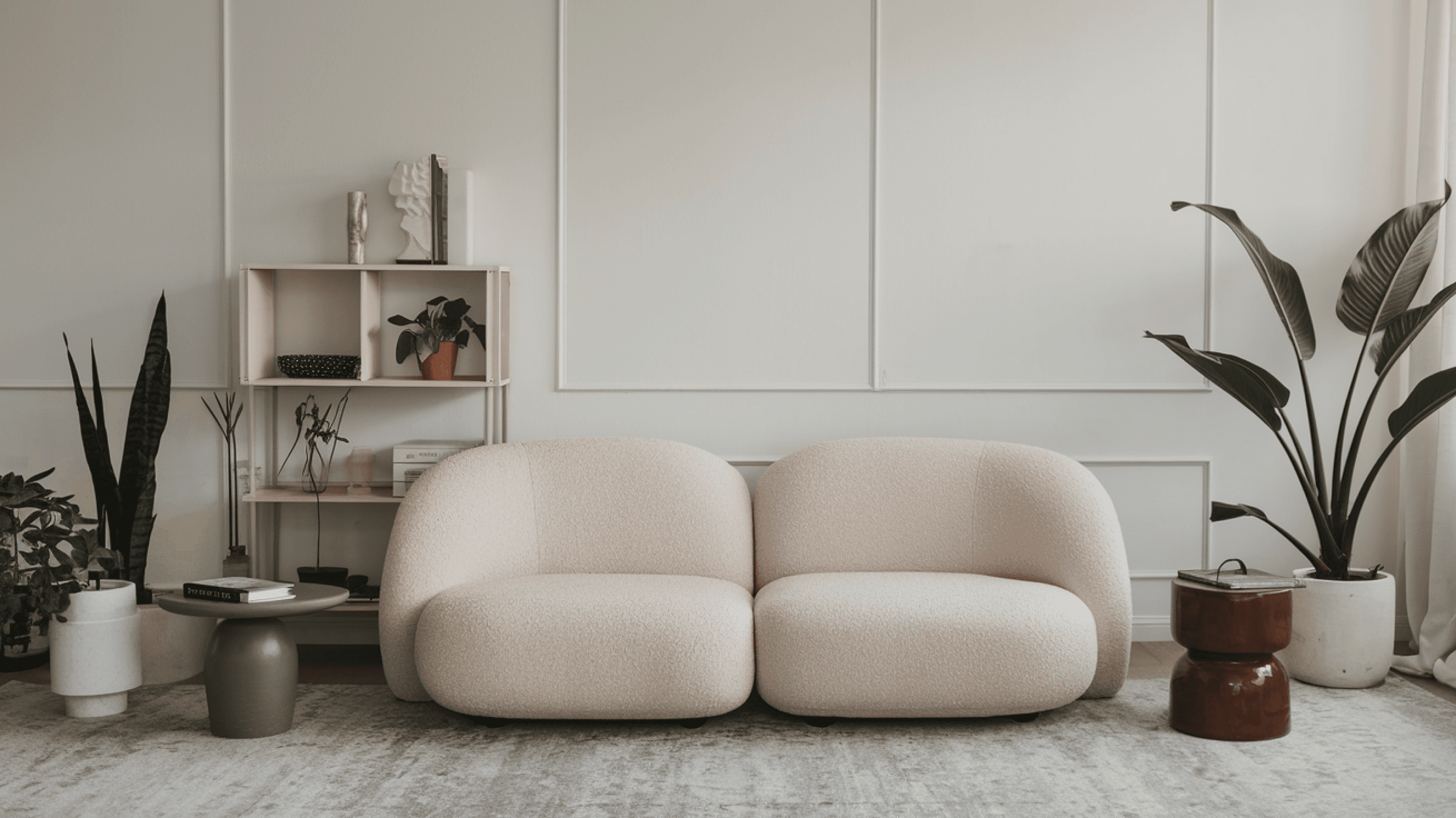 Living room with gray two-seater puffy sofa